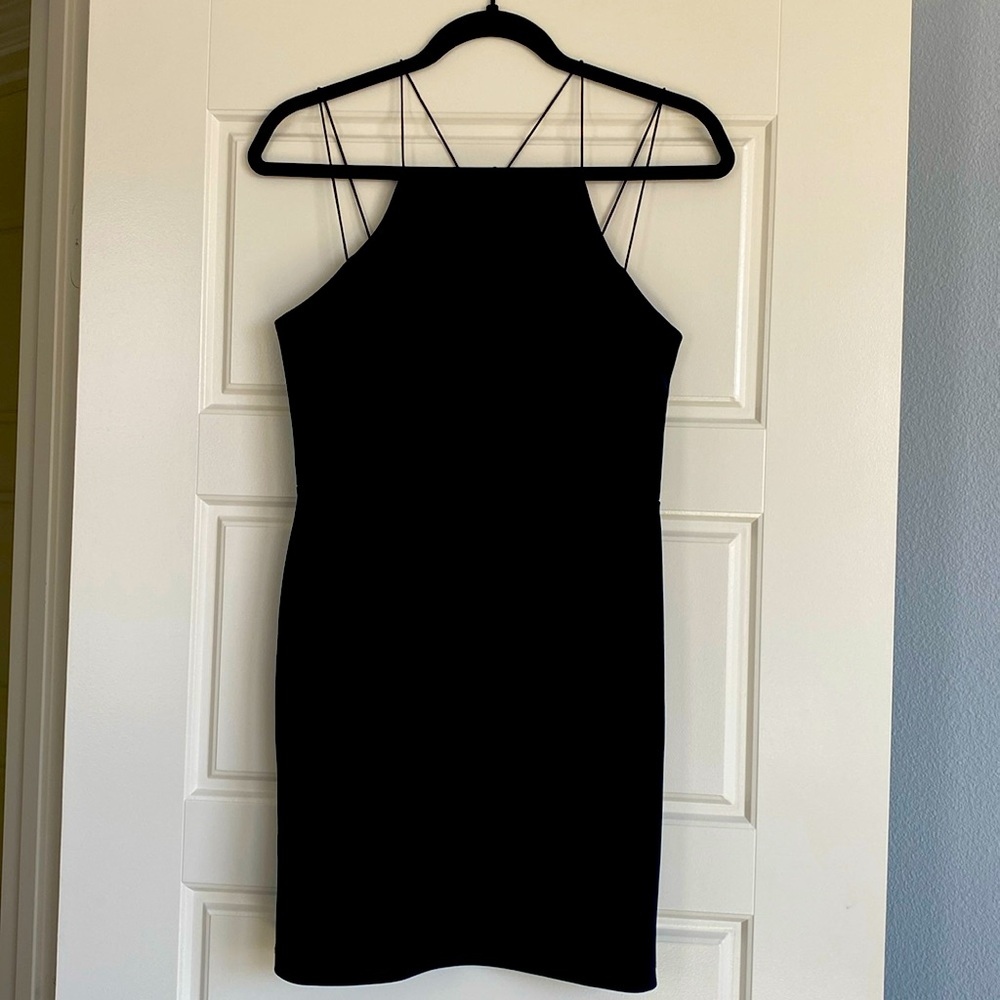 Black bodycon mini dress.